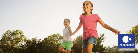 Image of children are happily playing outside.