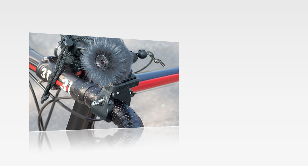 Fixation caméscope (pour le guidon)