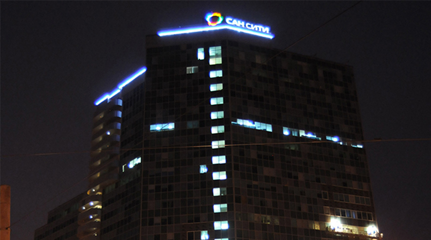 An image of Sun City Mall building in nighttime
