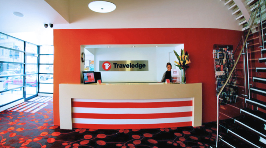 An image of a reception desk in Travelodge Hotel 