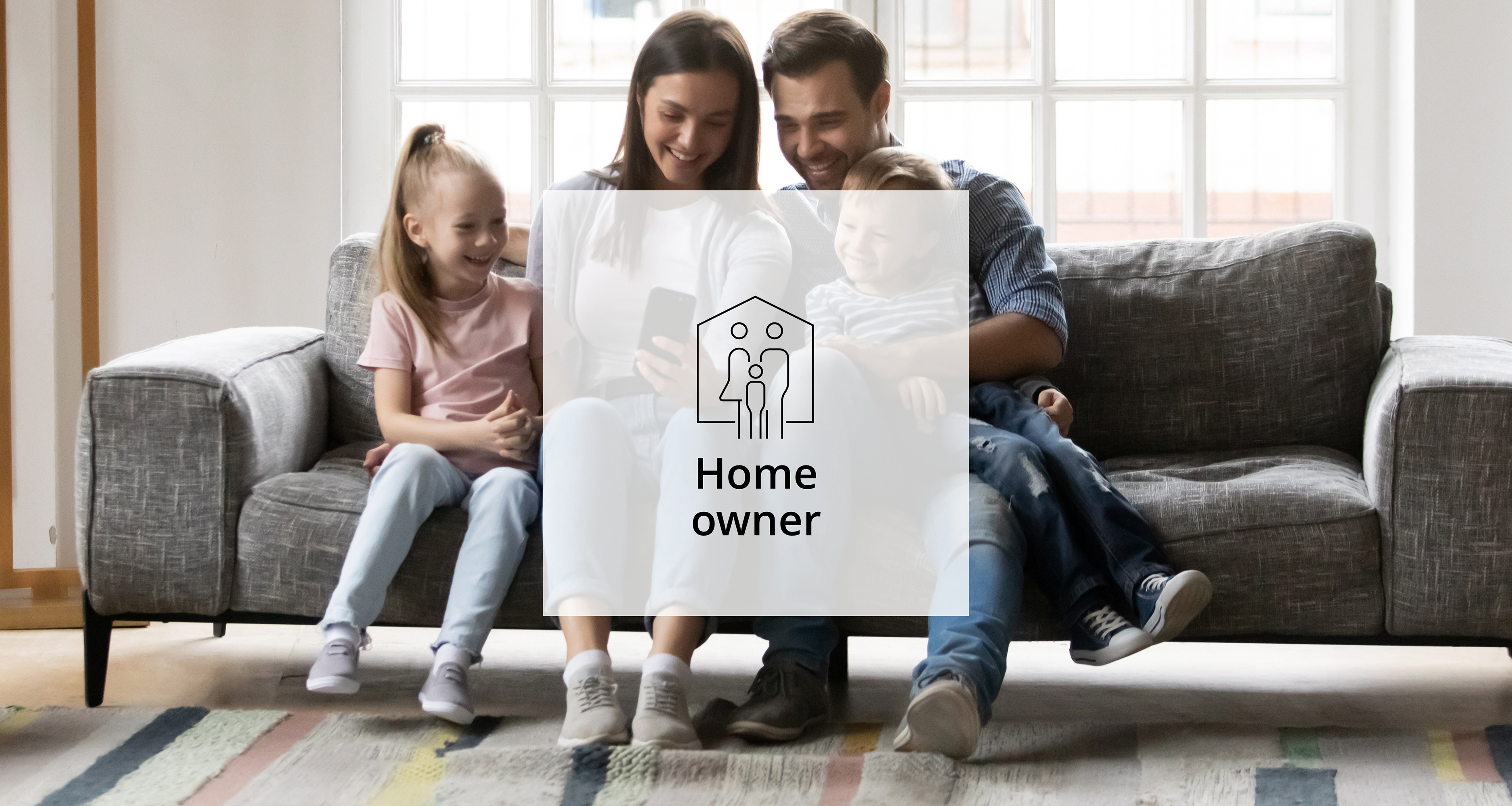 An image of families sitting on sofa as Home Owners