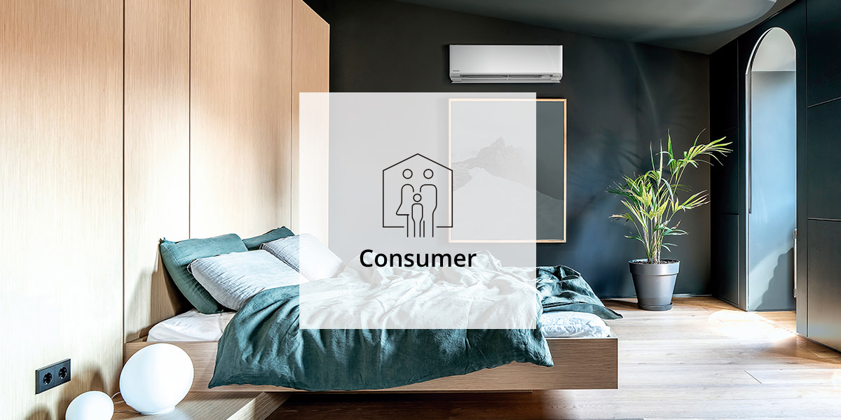 An image of a clean, comfortable living room with a wall-mounted air conditioner