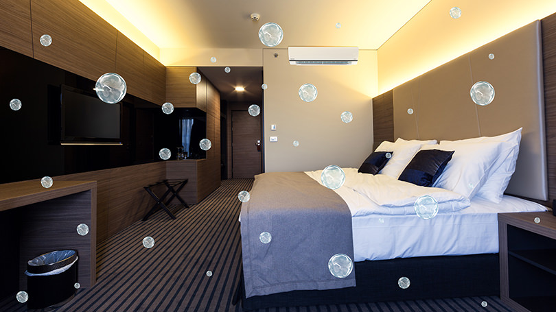 An image showing that nanoe™ X is effective against odours embedded in fabrics such as on hotel beds, and the entire room is kept clean