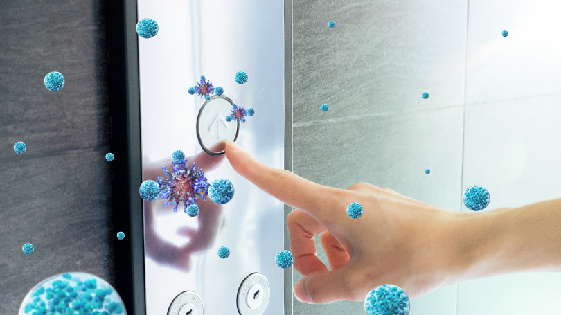 Une image montrant l'efficacité de nanoe™ contre certains virus ayant adhéré au tableau de commandes d'un ascenseur.