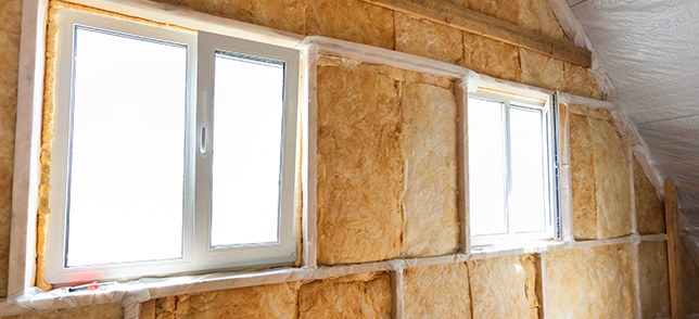 An image of a house that is installing thermal insulation during construction