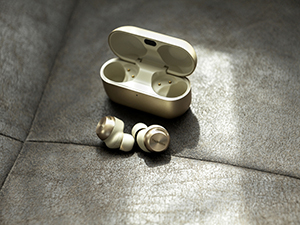 Earphones placed on a surface