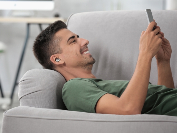 Male wearing earphones