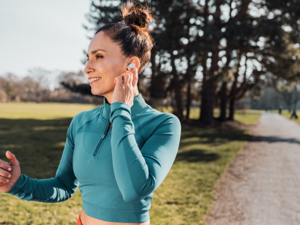 Female working out with earphones