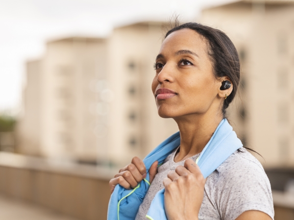 Female working out with earphones