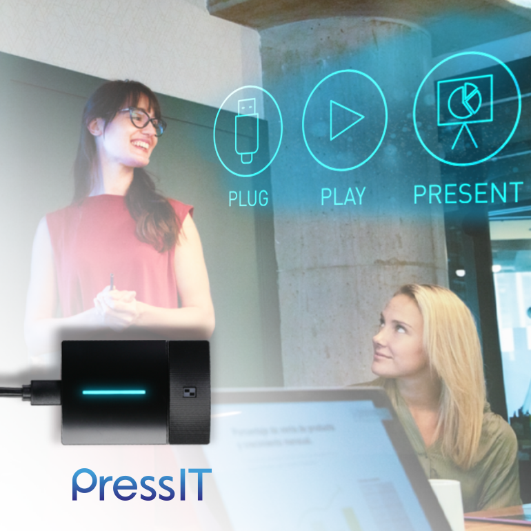 „Dwie osoby w biurze z urządzeniem oznaczonym „PressIT” na pierwszym planie”.