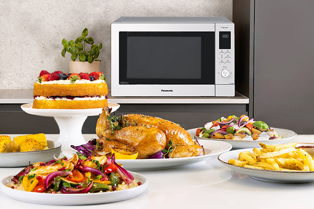 NN-CD88 Microwave Combi Oven with Air fry with an array of tasty dishes including roast chicken, fries, halloumi salad, cake.