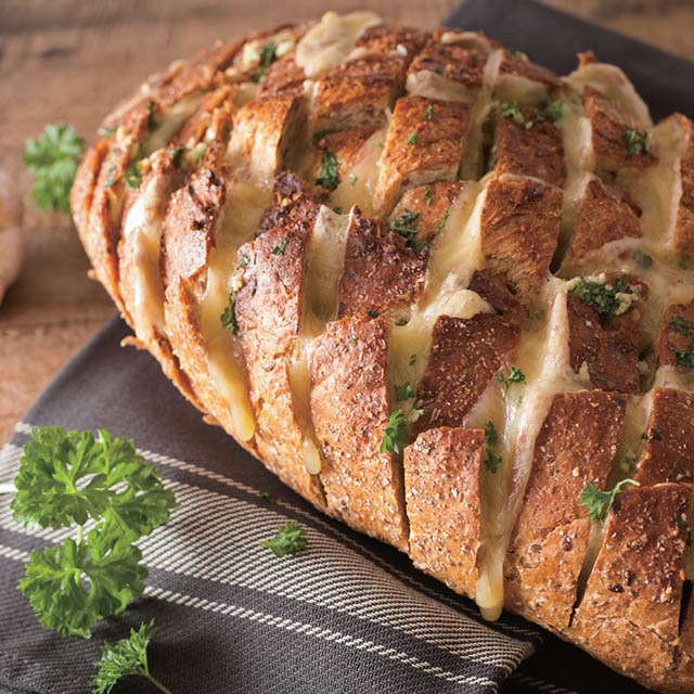 Cheesy Garlic Hard-Crust Loaf See more