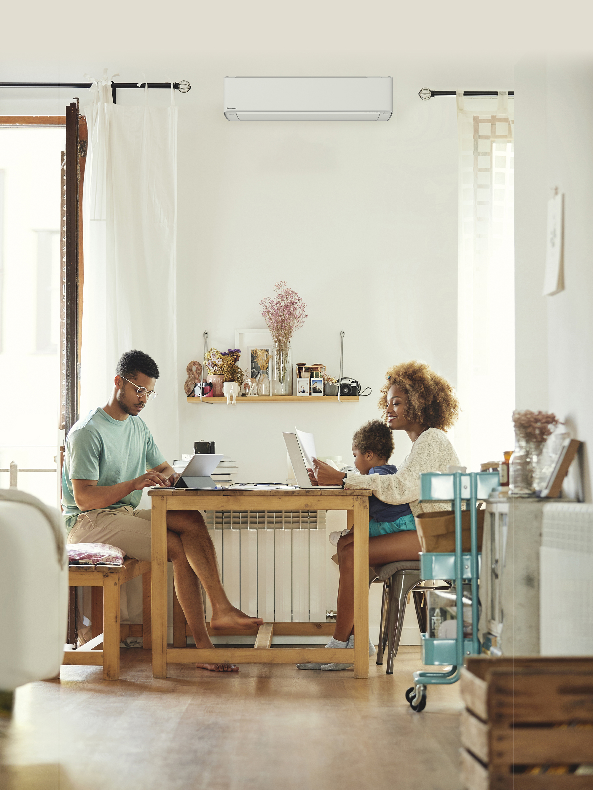 image:A young family around the table