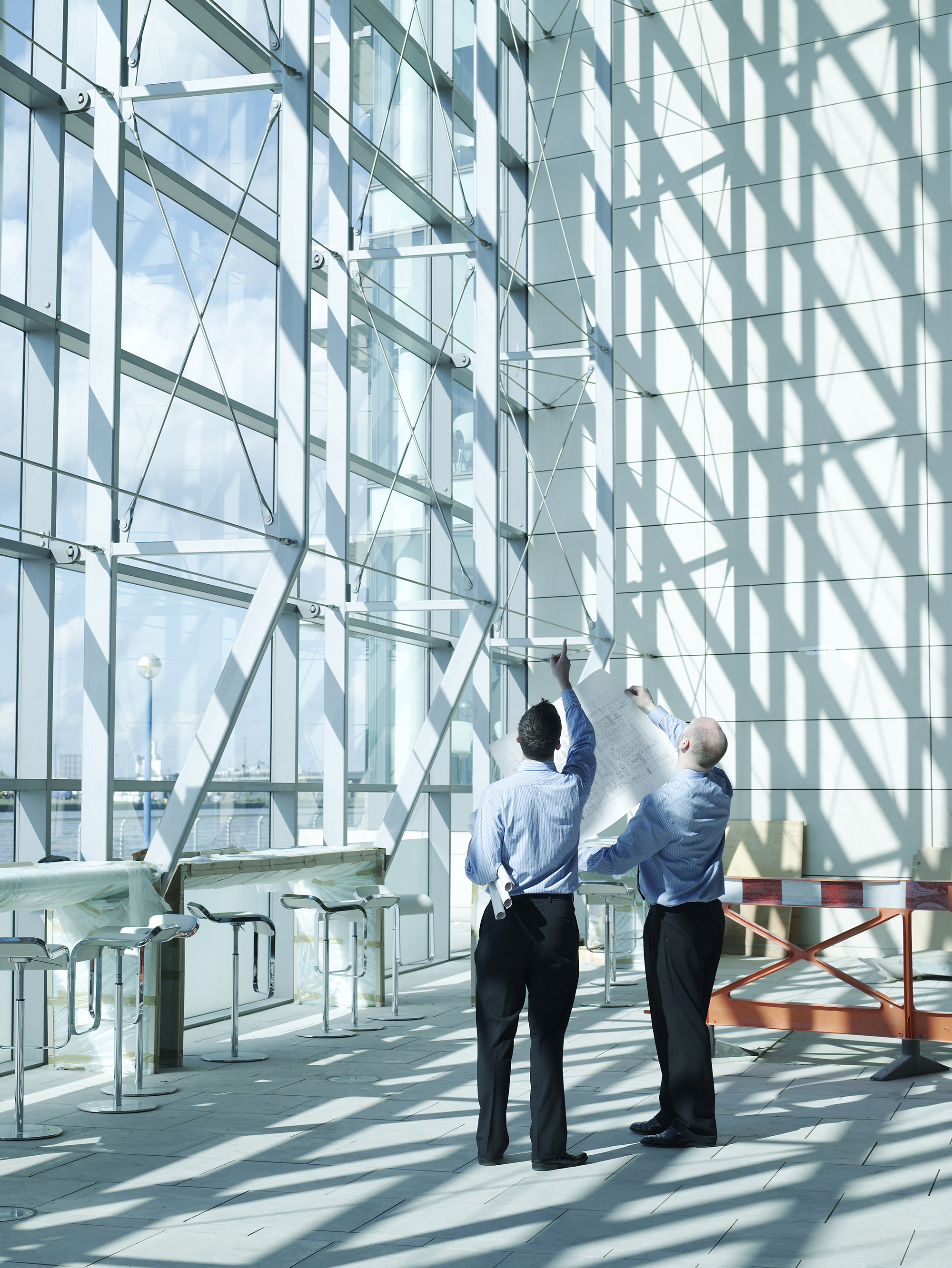 image:A staff inspecting building interior