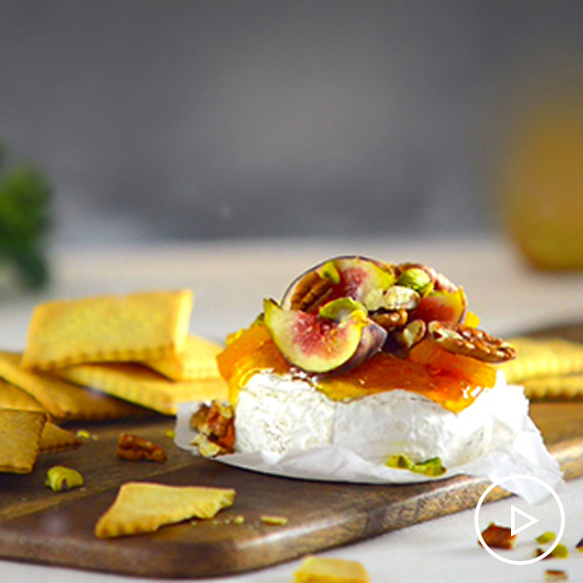 Baked Brie with Homemade Crackers See more