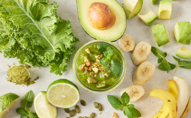 Green smoothie with fresh fruits and vegetables