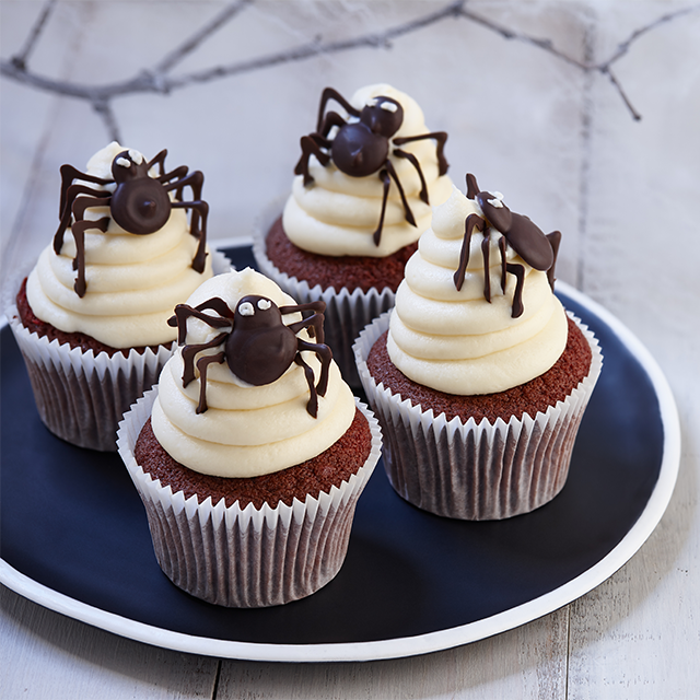 Butter cream topped Spooky Spider Cupcakes See more