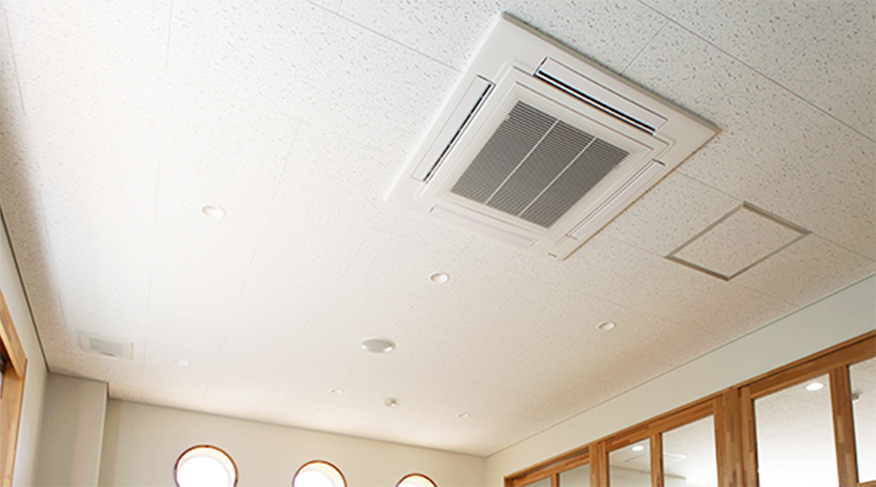 An image of installed 4 way cassette air conditioner with nanoeX logo