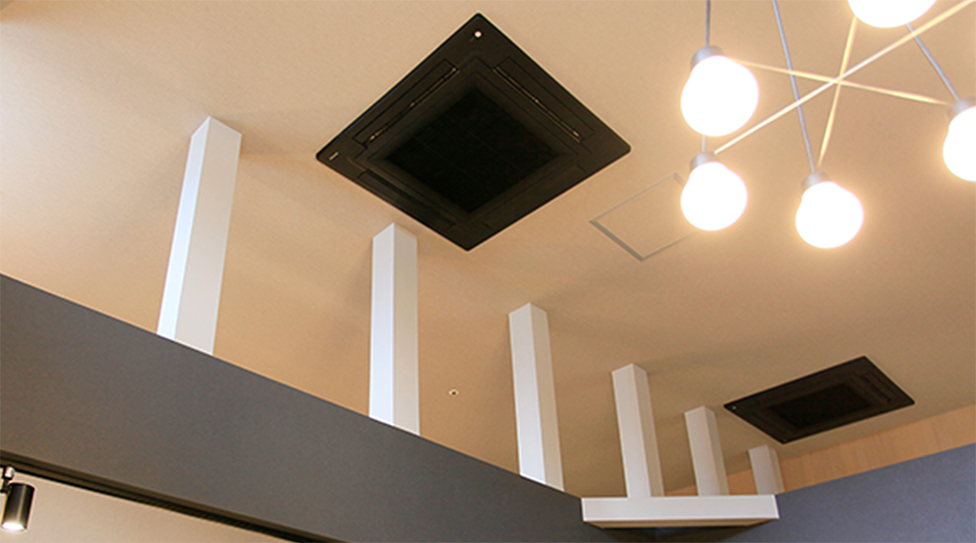 An image of installed 4 way cassette air conditioner with nanoeX logo