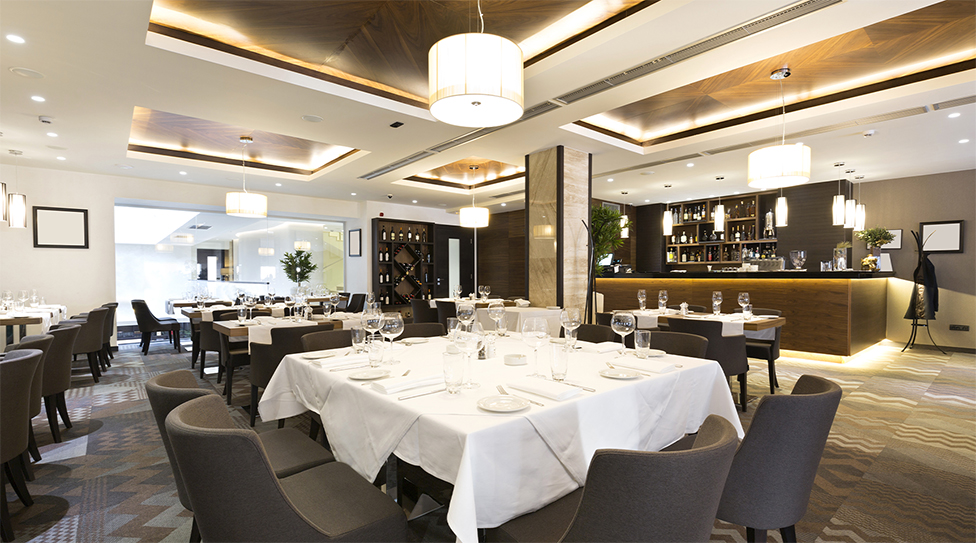 An image of a restaurant with nanoeX logo