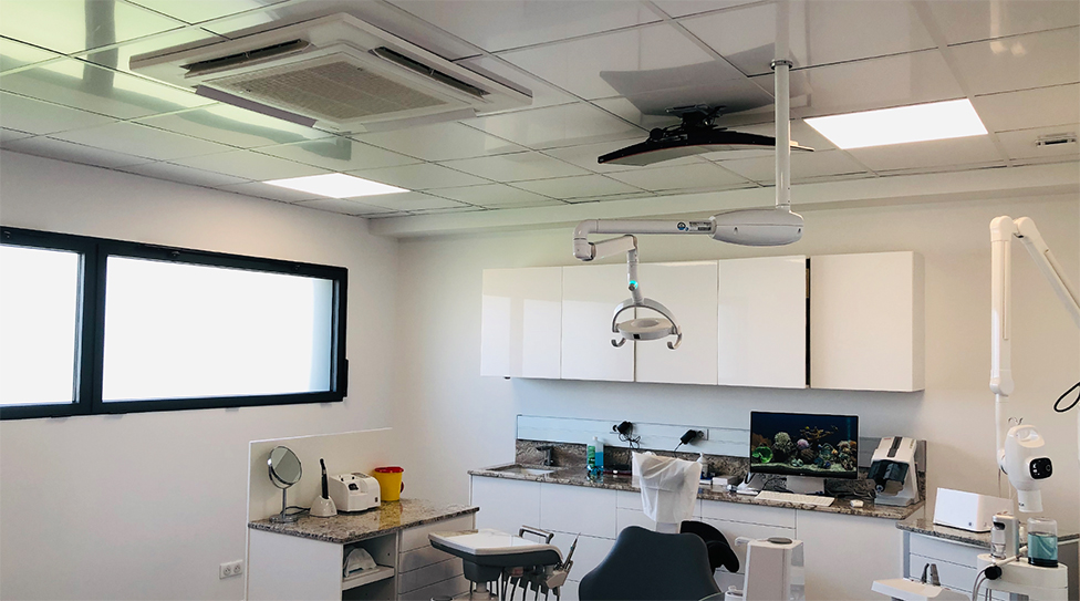 An image of installation of 4-way cassette air conditioner in a dentist with nanoeX logo