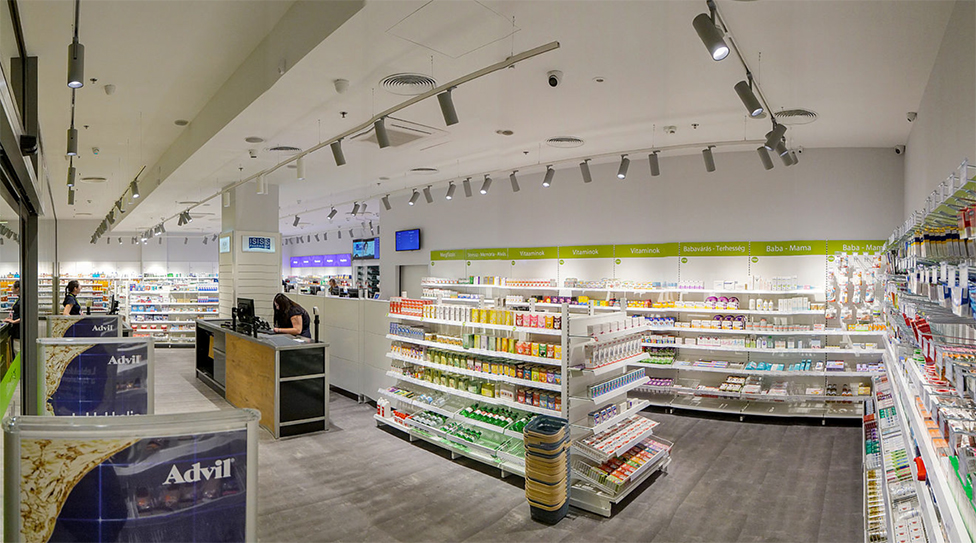 An image of installation of air conditioners in a pharmacy with nanoeX logo