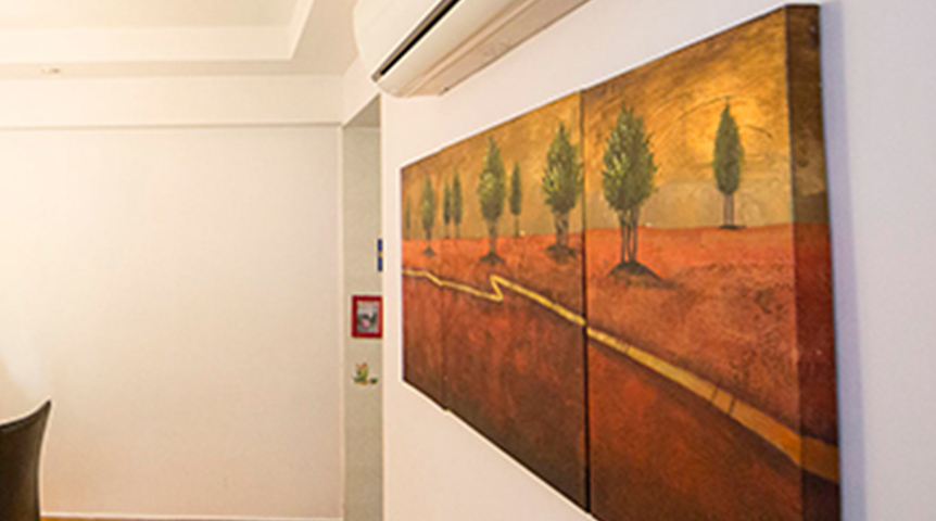 An image of a room decorated with an artwork