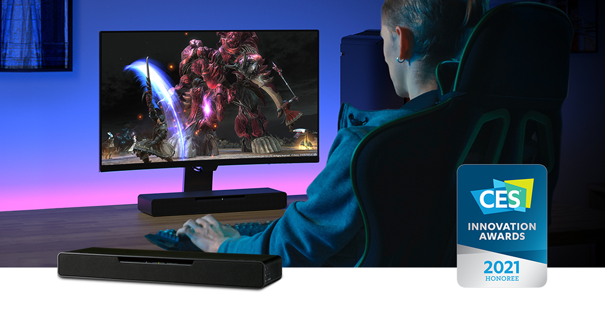 A young man plays the video game "Final Fantasy" on his computer, which is connected to the SC-HTB01 soundbar