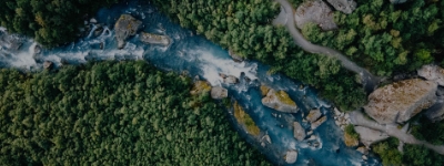 A linked image to "Environmental Initiatives" page.