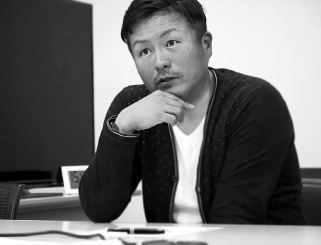 Kazunori Kado -Camera product planning