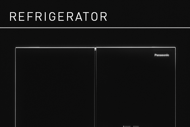 Link Banner: Refrigerator. Dramatic black and white close-up image of a refrigerator, subtle highlights giving it form against the dark background.