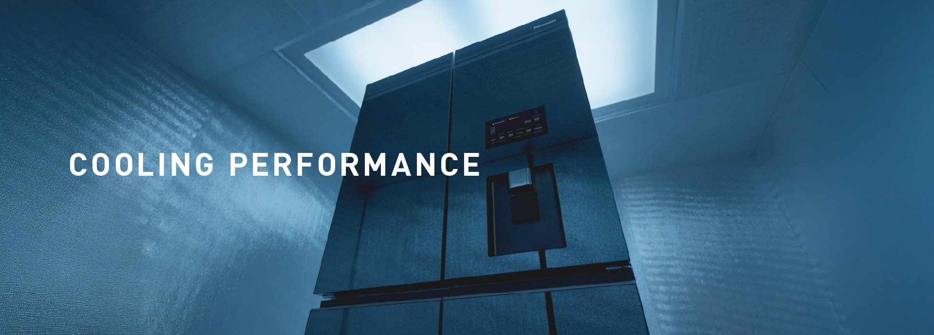 COOLING PERFORMANCE. Panasonic refrigerator in a testing room.