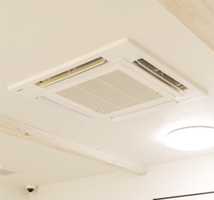 An image of installed 4-way cassette air conditioner