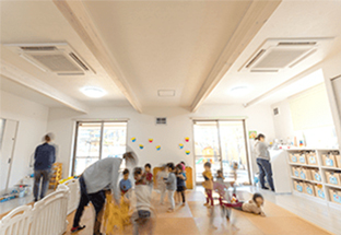 An image of two installed 4-way cassette air conditioners