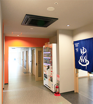 An image of installed 4-way cassette air conditioner