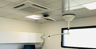 Images of dentist, outdoor units, and 4-way cassette air conditioner