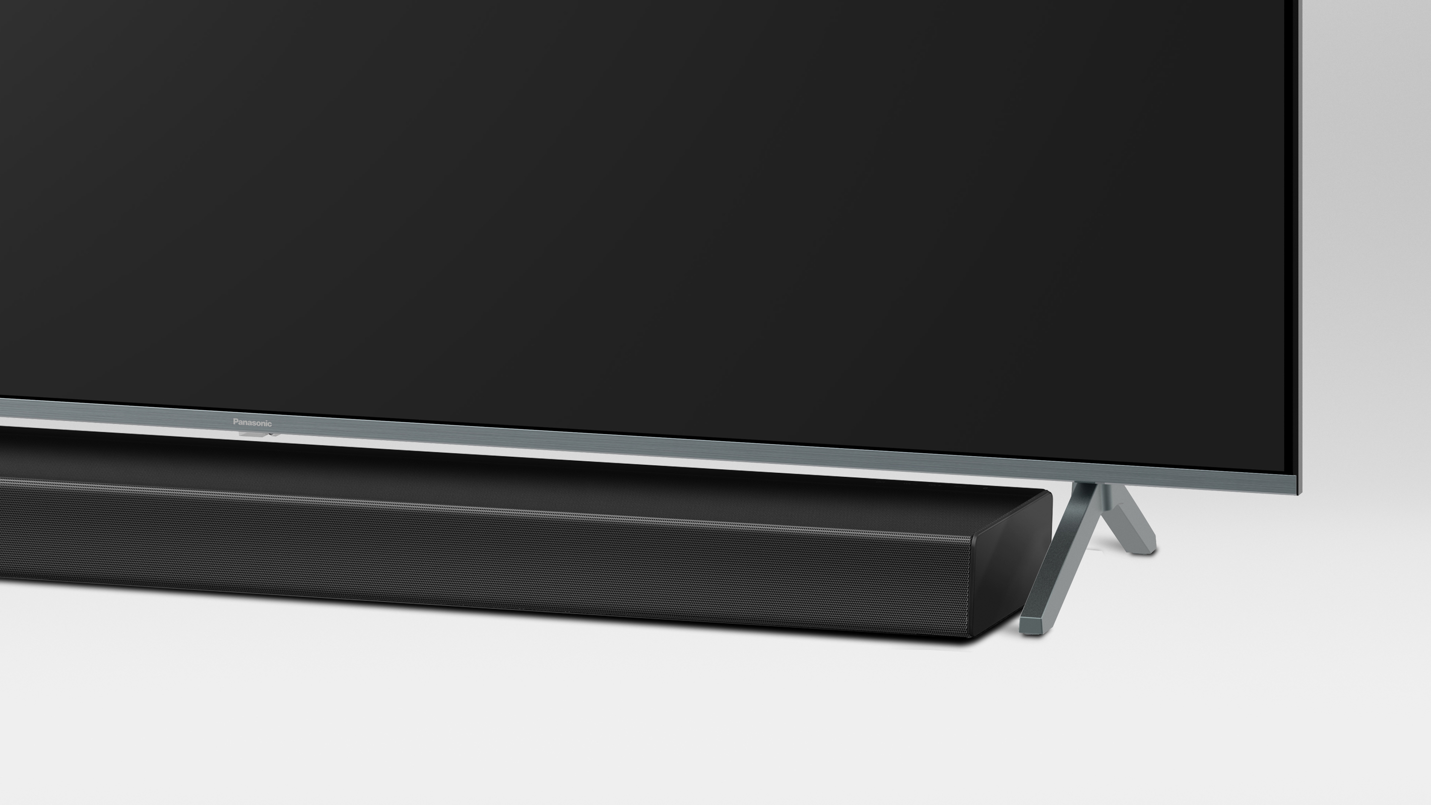 Zvukový panel je úhľadne uložený. Nádherný pocit jednoty, ktorý vhodne dopĺňa dizajn.