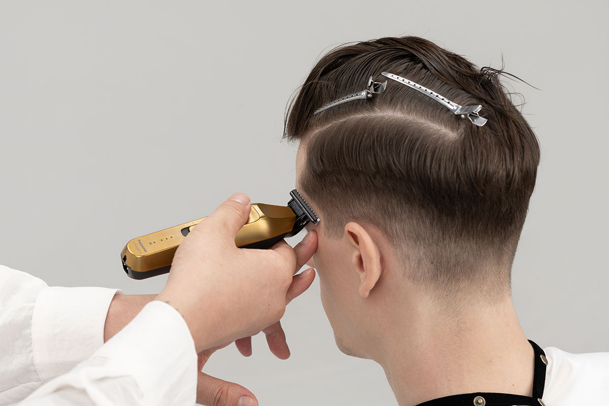 In Use on the Temples with a Hair Trimmer ER-XT70