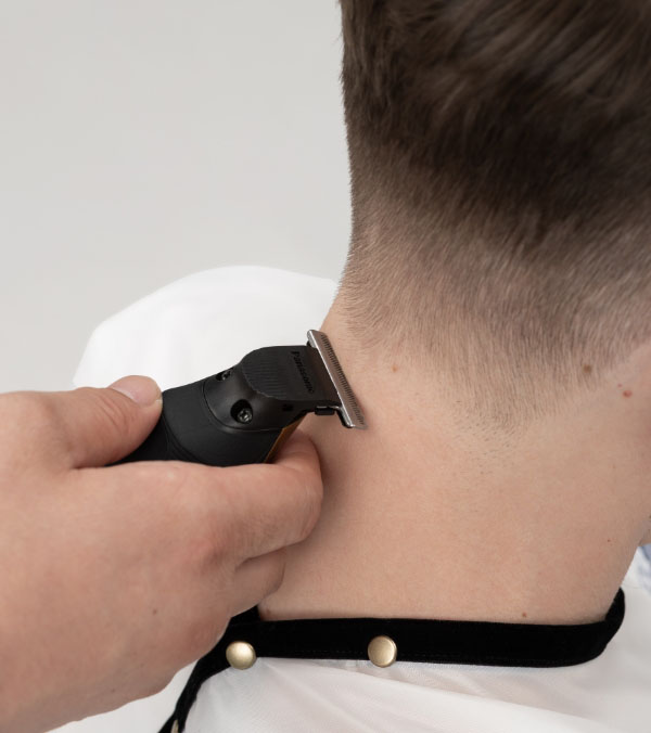 In Use on the Neckline with a Hair Trimmer ER-XT70