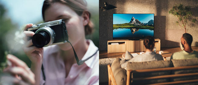 A young person taking photographs in the woods. A couple watching a nature scene on a large-screen tv in a living room.