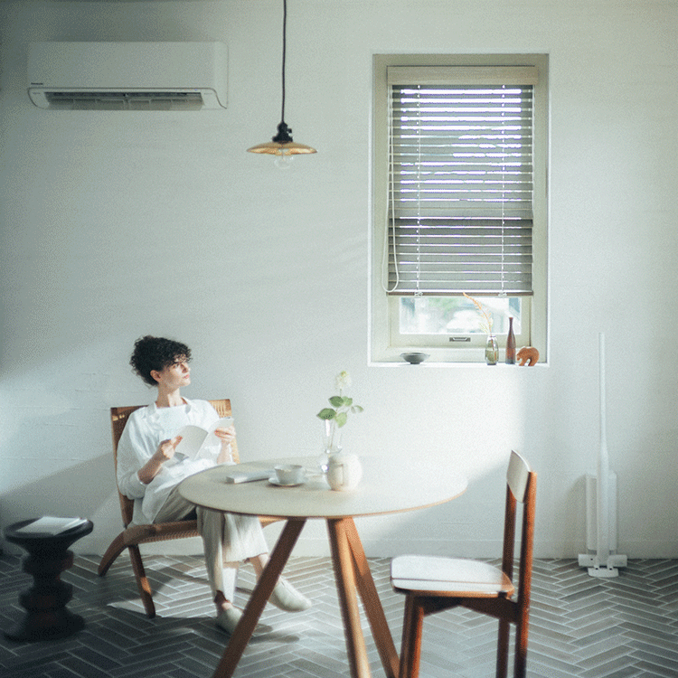 Side-by-side photos: Someone relaxing near an A/C unit in a bright room, and a woman taking freshly cleaned laundry out of a front-loading washing machine.