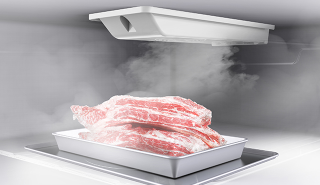 Image of frozen meat in a Prime Freeze compartment inside a refrigerator.