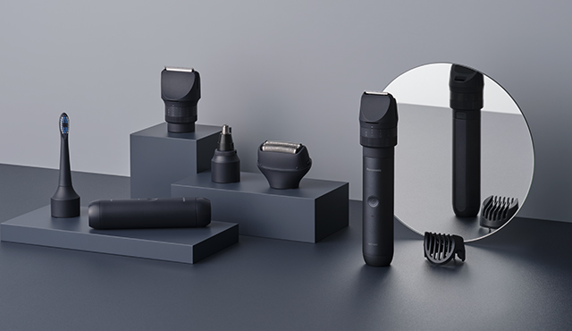 Photo of Modular Personal Care System, including a compact main body and various shaver, trimmer, and toothbrush attachments.