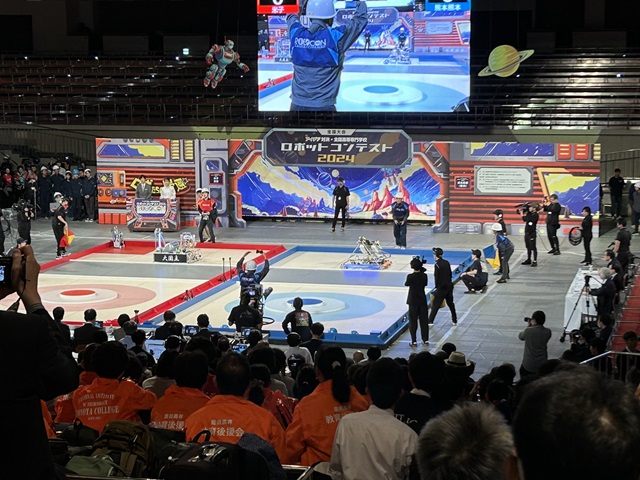 Photo of a robotics competition supported by Panasonic, showcasing efforts to foster the growth of next-generation talent through hands-on STEM learning.