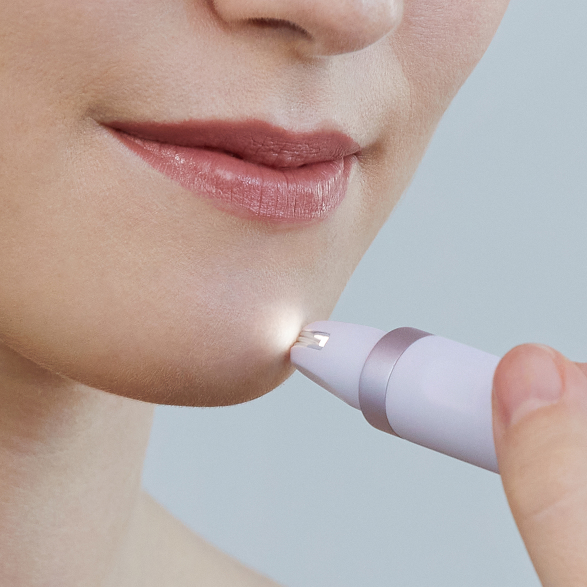 Afbeelding van het behandelen van haar met ledlicht