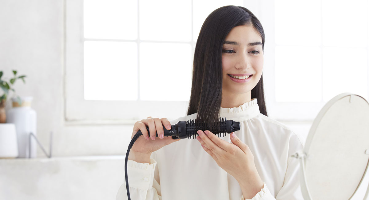Use the hair brush iron like a hair brush for easy styling