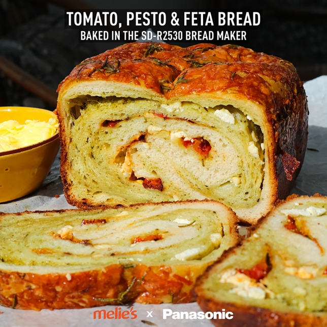 This Caramelised Rosemary, Pesto & Cheese Bread, created by Melie’s Kitchen, is a golden, flavour-packed loaf that’s crisp on the outside, soft on the inside, and effortlessly baked in the Panasonic Automatic Bread Maker.
