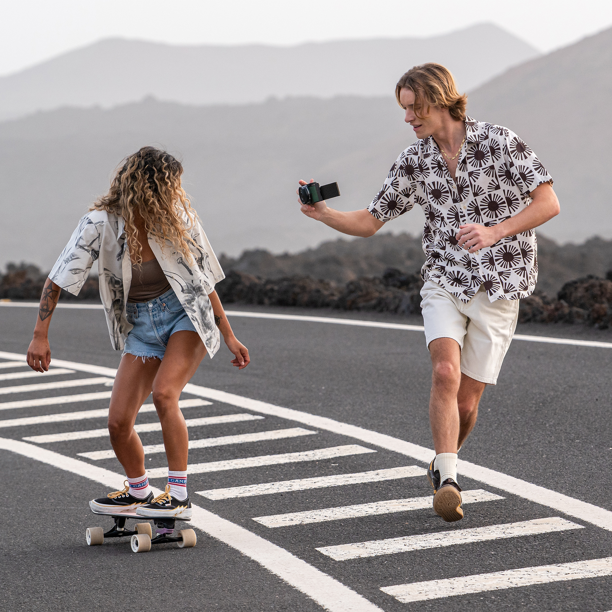 A content creator shooting handheld with the LUMIX S9