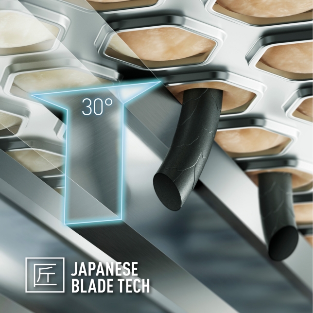 Close-up of a stainless steel blade cutting hair at a 30-degree angle