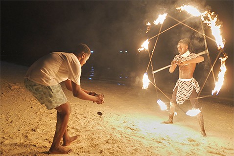 A content creator shooting handheld with the LUMIX S5IIX